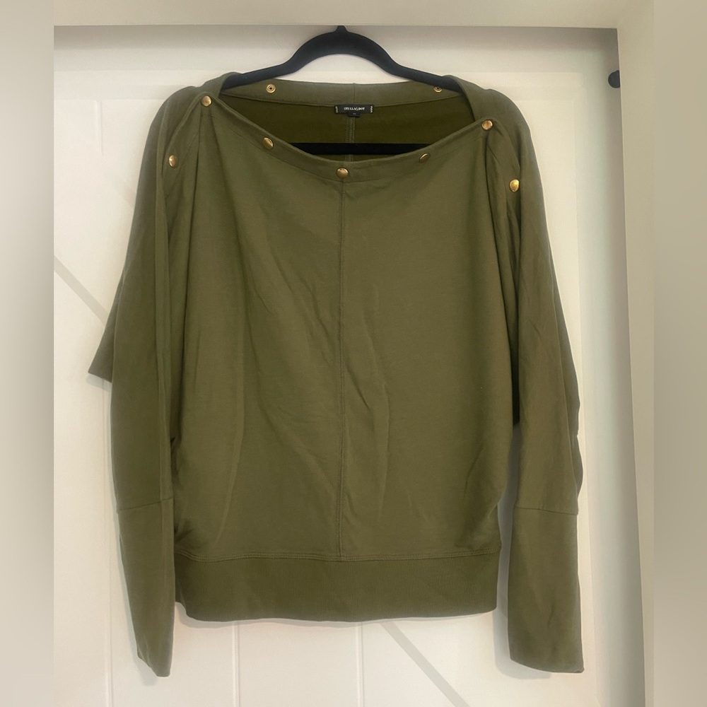Stella and Dot top.  Grommet buttons can be worn off the shoulder. Size M